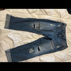 INC distressed, straight leg, curvy fit jeans.